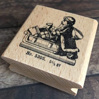 Rubber stamp santa on sledge