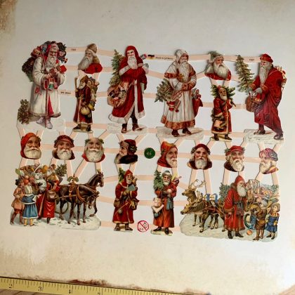 Oblaten / Glanzbilder Weihnachtsmänner und Rentierschlitten (170051)