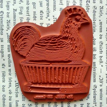 Chicken on a pedestal makistamps